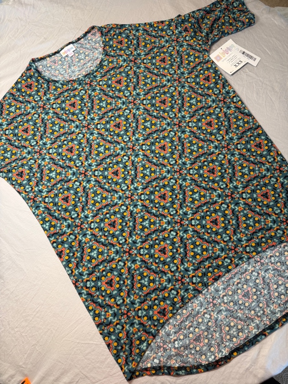 LuLaRoe Teal Geometric Mosaic Short Sleeve Tunic